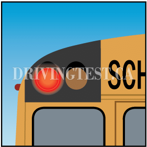 Test 4 - If there is a median on the road, when do you have to stop for school buses that are flashing their red lights?