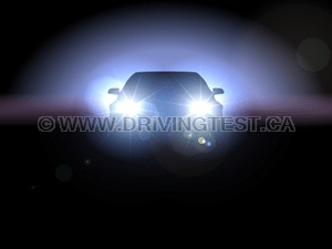 Test 3 - What should you do if another driver does not dim their headlights while approaching you at night?