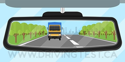 Test 2 - What do you need to be able to see in your rearview mirror before cutting back in after passing a truck?