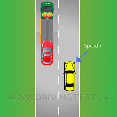 Test 1 - What speed are you allowed to drive while passing a tow truck that is assisting another vehicle and has its amber beacon flashing on the highway?